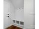 Functional mudroom with built-in storage, bench seating, and hooks near the entrance at 7322 Vesper Dr, Huntersville, NC 28078