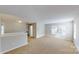 Spacious carpeted living room with large windows and ample natural light at 8139 Deodora Cedar Ln, Charlotte, NC 28215