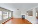 Living room with a fireplace and lots of natural light at 8139 Deodora Cedar Ln, Charlotte, NC 28215