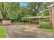 This house has a paved backyard and carport at 841 12Th Nw Ave, Hickory, NC 28601