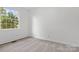 Cozy bedroom with carpet flooring, radiator heating, and a window view at 841 12Th Nw Ave, Hickory, NC 28601