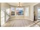 Bright dining area with bay windows and modern laminate flooring, perfect for Gathering meals at 841 12Th Nw Ave, Hickory, NC 28601
