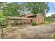 This house has a carport, paved driveway, and back entrance at 841 12Th Nw Ave, Hickory, NC 28601