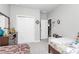 Comfortable bedroom featuring neutral walls, carpet, and a large closet at 9011 Kensington Forest Dr, Harrisburg, NC 28075