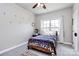 Bedroom with carpet and a string of lights at 9011 Kensington Forest Dr, Harrisburg, NC 28075