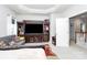Bonus room with tray ceilings and versatile design offers cozy relaxation and entertainment space at 9011 Kensington Forest Dr, Harrisburg, NC 28075