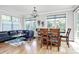 Dining area with lots of natural light and an adjacent, comfortable living space at 9011 Kensington Forest Dr, Harrisburg, NC 28075