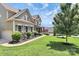 Charming home with well-manicured lawn, inviting curb appeal and attached garage at 9011 Kensington Forest Dr, Harrisburg, NC 28075