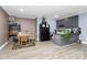 Open kitchen with stainless steel appliances, ample counter space, and a breakfast area at 9011 Kensington Forest Dr, Harrisburg, NC 28075