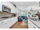 Kitchen with granite countertops, stainless steel appliances, and open layout at 9011 Kensington Forest Dr, Harrisburg, NC 28075