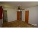 Bedroom featuring two closets and an en-suite bathroom at 908 Ravendale Dr, Charlotte, NC 28216