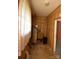 Utility room with water heater and shelving at 908 Ravendale Dr, Charlotte, NC 28216