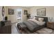 A cozy bedroom featuring neutral walls, natural light, and minimalist furnishings at 9121 Kings Canyon Dr, Charlotte, NC 28210
