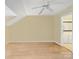 A bright and airy bedroom with natural wood floors and a neutral color scheme at 9121 Kings Canyon Dr, Charlotte, NC 28210