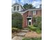 Charming brick home with a welcoming front entrance and well-manicured garden in a lovely neighborhood at 9121 Kings Canyon Dr, Charlotte, NC 28210