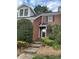Charming brick home with a welcoming front entrance and well-manicured garden in a lovely neighborhood at 9121 Kings Canyon Dr, Charlotte, NC 28210