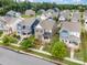 Aerial view showcasing the neighborhood's beautiful homes at 915 Claires Creek Ln, Davidson, NC 28036