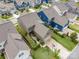 Aerial view of a well-maintained home with a manicured backyard at 915 Claires Creek Ln, Davidson, NC 28036