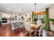 Dining area with hardwood floors adjacent to kitchen, great for entertaining at 915 Claires Creek Ln, Davidson, NC 28036