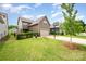 Charming two-story house with a well-manicured lawn and driveway at 915 Claires Creek Ln, Davidson, NC 28036