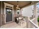 Inviting front porch with comfortable seating and stylish decor at 915 Claires Creek Ln, Davidson, NC 28036