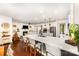 Bright, open kitchen with a large island, stainless steel appliances, and hardwood floors at 915 Claires Creek Ln, Davidson, NC 28036