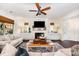 Spacious living room features a fireplace and custom built-in cabinets at 915 Claires Creek Ln, Davidson, NC 28036