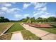 Community playground with various activity centers at 915 Claires Creek Ln, Davidson, NC 28036