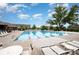 Beautiful community pool with lounge chairs, perfect for relaxation at 915 Claires Creek Ln, Davidson, NC 28036