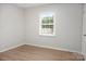 Well-lit bedroom with a window providing natural light and a calming atmosphere at 918 Creekridge Dr, Monroe, NC 28110