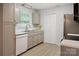 Well-lit kitchen with modern appliances, ample counter space, and practical storage solutions at 918 Creekridge Dr, Monroe, NC 28110