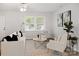 Bright living room featuring modern furnishings, ample natural light, and a cozy atmosphere at 918 Creekridge Dr, Monroe, NC 28110