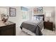This bedroom features neutral walls, carpet flooring, and tasteful decorative accents at 10108 Florentine Way, Charlotte, NC 28214