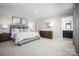Comfortable main bedroom with a neutral color scheme and an ensuite bathroom at 10108 Florentine Way, Charlotte, NC 28214