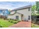 Beautiful home exterior with brick patio and landscaping at 10449 Quiet Bay Ct, Charlotte, NC 28278