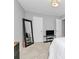 Neutral bedroom featuring carpet and a large mirror at 10449 Quiet Bay Ct, Charlotte, NC 28278