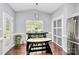 Cozy dining area with a modern table and ample natural light at 10449 Quiet Bay Ct, Charlotte, NC 28278