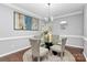 Charming dining area featuring stylish lighting and elegant decor at 10449 Quiet Bay Ct, Charlotte, NC 28278