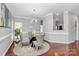 Cozy dining room with unique decor and large window for ample light at 10449 Quiet Bay Ct, Charlotte, NC 28278