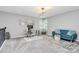 Bright office space with carpet floors, a comfortable sofa, and stylish decor at 10449 Quiet Bay Ct, Charlotte, NC 28278