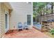 Backyard patio with seating and outdoor shower at 10449 Quiet Bay Ct, Charlotte, NC 28278