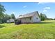 Exterior view featuring the deck, yard, and side of the home at 105 Saddlewood Ln, Statesville, NC 28625