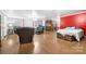 Open basement space with a mix of living and dining areas, perfect for entertaining or relaxing at 105 Saddlewood Ln, Statesville, NC 28625