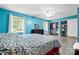 Bright bedroom featuring an open closet with shelving and ample storage space for shoes, hats, and clothing at 105 Saddlewood Ln, Statesville, NC 28625