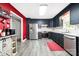 Modern kitchen featuring stainless steel appliances and custom cabinets at 105 Saddlewood Ln, Statesville, NC 28625