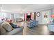 Comfortable living room with hardwood flooring, a ceiling fan, and natural light at 105 Saddlewood Ln, Statesville, NC 28625