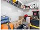 Walk-in storage featuring overhead shelving, multiple storage containers, various boxes and bags for ample storage space at 105 Saddlewood Ln, Statesville, NC 28625