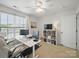 Bedroom featuring white desk and chair with computer, and a bookshelf at 1061 Woodglen Ln, Matthews, NC 28104