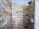 Tiled shower with a rainfall showerhead and convenient built-in shelving at 1061 Woodglen Ln, Matthews, NC 28104