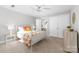Bedroom with a white metal frame bed, white closet doors and a floral comforter at 1115 Maremont Ct, Matthews, NC 28104